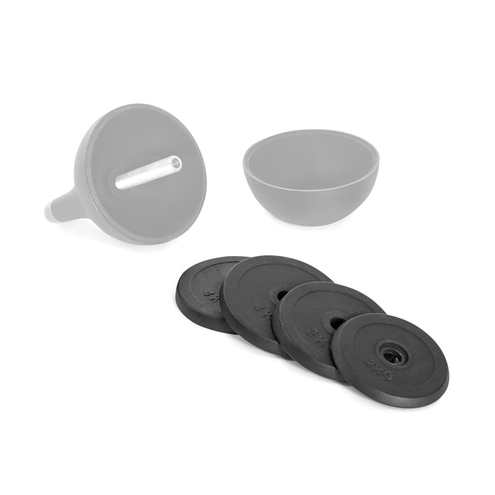 A Bells of Steel 12-32 KG Expansion Pack for the 12-20.5 KG Adjustable Kettlebell sits next to a bowl.