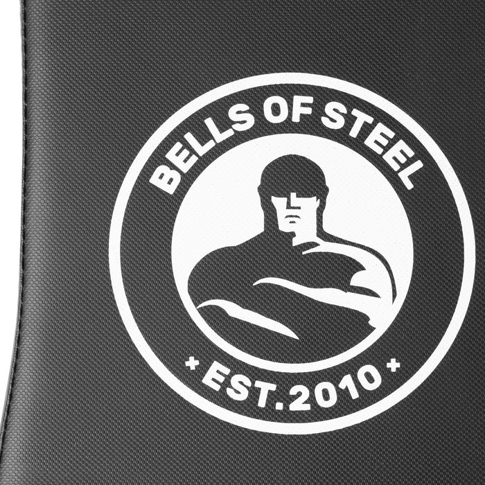 Close-up of a black surface featuring Bells of Steel’s white circular logo with a muscular figure and "EST. 2010." Compatible with the Adjustable Utility Bench.