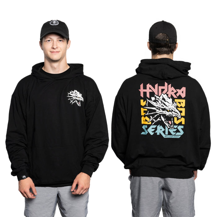 A man wears a black Bells of Steel Bamboo Hoodie and gray shorts, shown from front and back. The hoodie displays a dragon graphic on the chest and a large, colorful "HYDRA BASE SERIES" dragon design on the back.