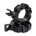 Two black, rugged Barbell Zip Clips - Half Standard (Pair) from Bells of Steel, circular with ridged edges and integrated clips, are stacked together on a white background, resembling standard barbell clips.