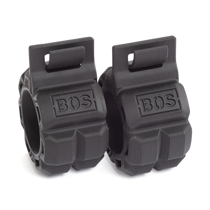 Two black, cylindrical rubber grips with textured surfaces and “Bells of Steel” embossed on each, these Barbell Zip Clips offer a rugged design ideal for improving your exercise or fitness equipment setup.