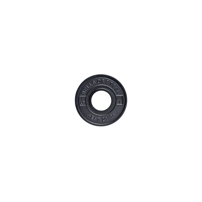 A black Calibrated Powerlifting Plate - LB by Bells of Steel, featuring "EST. 2010" embossed on it against a white background, provides precision for powerlifting enthusiasts.