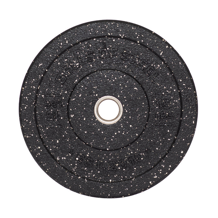 A close-up of Bells of Steel's Crumb Bumper Plate showcases its black design with white speckles, textured surface, and metallic center hole for barbells. Ideal for lifting, the plate features embossed weight identification.