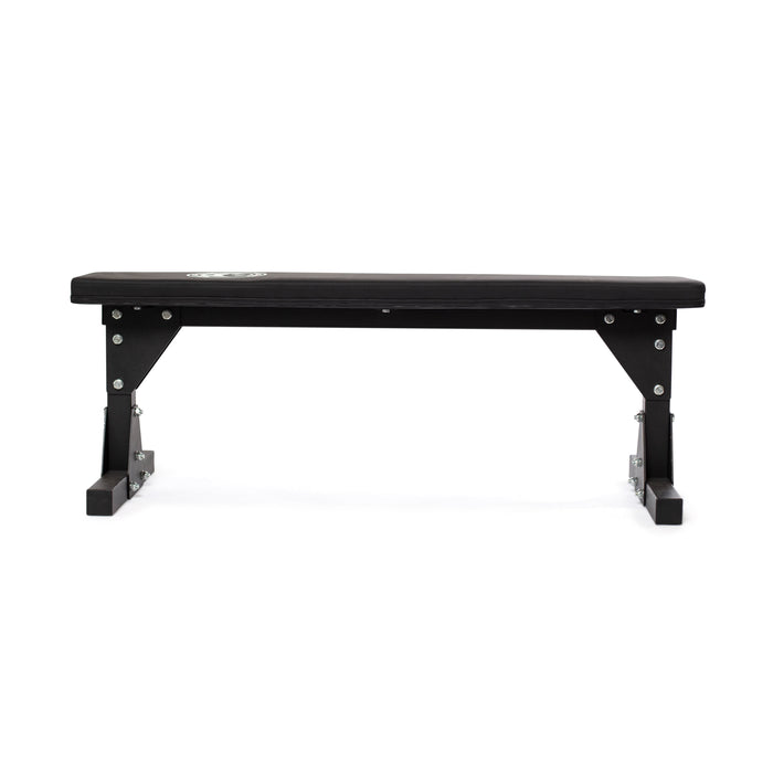 The Bells of Steel Flat Utility Bench features a black padded top, sturdy metal legs, and supports up to 661lb—ideal for strength training. This budget bench is shown against a plain white background.
