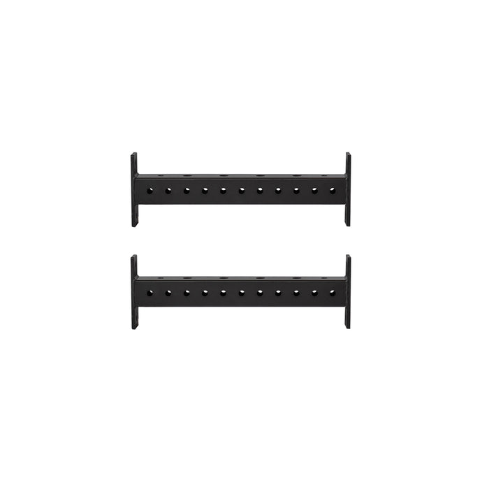 Two black Hydra Crossmembers by Bells of Steel, featuring evenly spaced holes, are positioned parallel to each other on a white background.