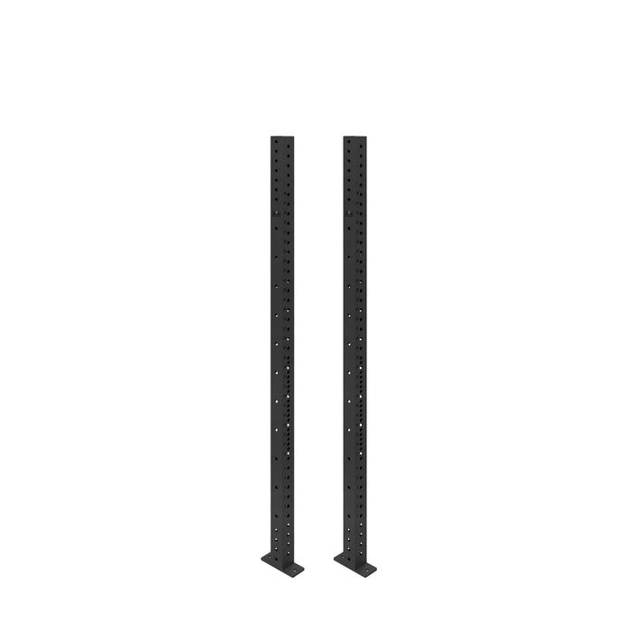 Two tall, black Bells of Steel Hydra Vertical Uprights with multiple holes stand side by side on flat bases, ready to support power rack attachments against a white background.