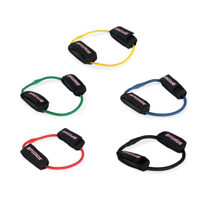 Five Leg Cords by Bells of Steel USA, in yellow, green, blue, red, and black—ideal for progressive resistance or leg workouts—each featuring black handles and “PROIRON” labels, displayed on a white background.