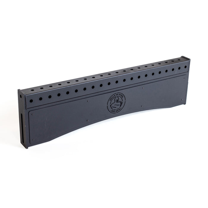 A black rectangular Bells of Steel Logo Plate Crossmembers bow rack with multiple holes on top for holding bows and a circular logo plate crossmember in the center.