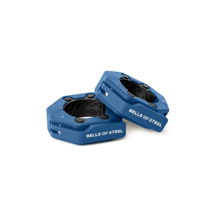 Two blue, hexagonal Magnetic Clamp Collars by Bells of Steel with black grips are stacked together on a plain white background. "BELLS OF STEEL" is printed in white on each collar.