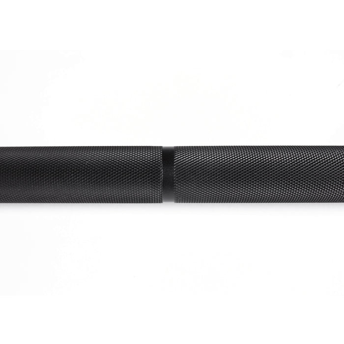 A close-up of the Bells of Steel Olympic Weightlifting Barbell showcases its black, textured finish and knurled grip pattern against a plain white background.