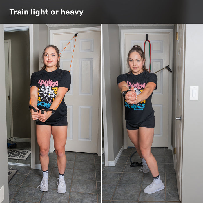 Wearing athletic apparel, a woman uses Bells of Steel USA Ripcords Premium Resistance Bands—featuring durable rubber handles anchored to a door—as she performs an exercise with both arms extended forward. The image is divided into two similar poses, with the caption above stating, “Train light or heavy.”.