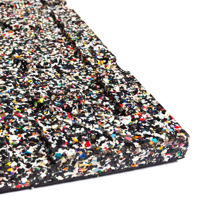 A close-up of the Bells of Steel Rubber Flooring Gym Mat 39" x 39" shows its thick, speckled surface with beveled edges, making it ideal for sound dampening or as a weightlifting mat in any gym.