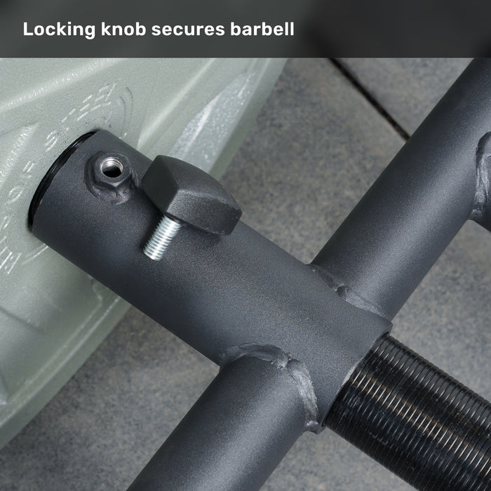 Close-up of a black Olympic bar secured with a locking knob, text above reads, "Locking knob secures barbell." A grey weight plate sits in the background. Perfect for use with the Bells of Steel Viking Press Attachment.