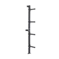 The Bells of Steel Wall-Mounted Plate Storage Rack is a black, vertical rack with four horizontal pegs, designed to optimize home gym storage by securely mounting weight plates on the wall.