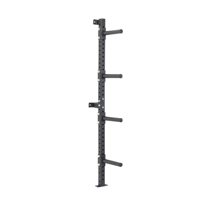 The Bells of Steel Wall-Mounted Plate Storage Rack is a black, vertical rack with four horizontal pegs, designed to optimize home gym storage by securely mounting weight plates on the wall.